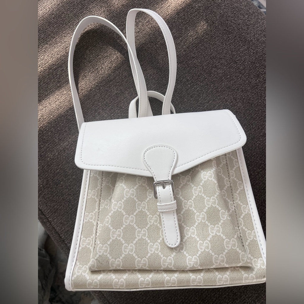 Monogram mini Backpack NWOT